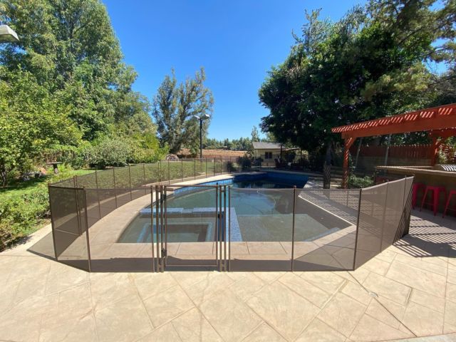 Pool fence installation in progress
